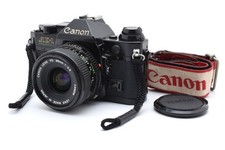 Appareil photo reflex 35mm DDP US Canon AE-1 program W/lens #1555527 HTT 159-...