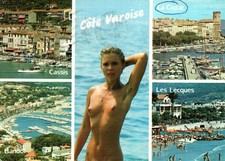 Femme seins nus sur la côte