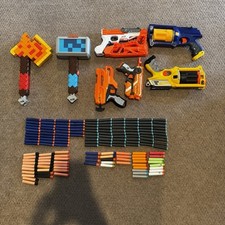 Assorted Nerf Guns And Darts