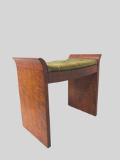 Banquette de piano  art déco en acajou moucheté recouvrement velours .XX siècle.