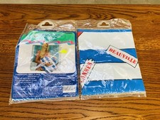 Paire de coussins valise