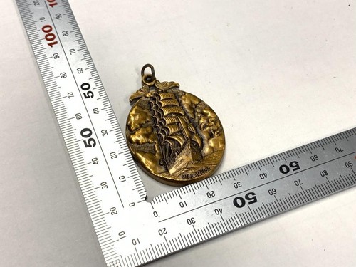 Pendentif médaille voilier