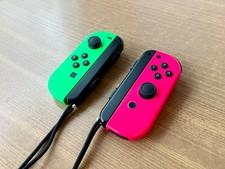 Lot 2 Manettes Joy-cons Officielles Nintendo Switch TBE Rose et Vert Néon !