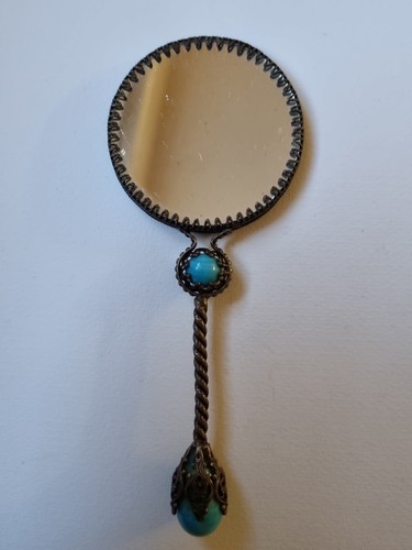Joli miroir face main - face,