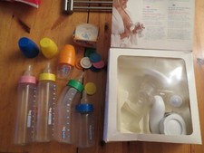 Lot de 5 biberons et 1 tire-lait