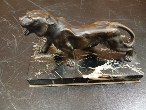 Lionne bronze art - en,