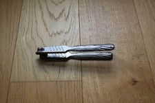 Ancien casse noix / noisettes en acier forgé AMSTUTZ René