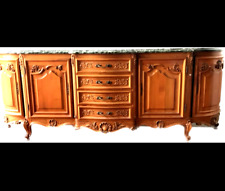 bahut quatre portes un rang de tiroirs merisier massif dessus marbre .XX siècle.