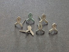 Insigne de col ou de coiffe