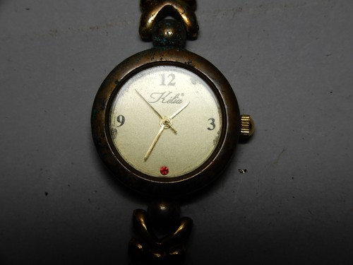 Montre quartz dorée femme - quartz,