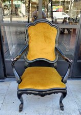 FAUTEUIL DE STYLE BAROQUE MAJORQUIN. BOIS DE NOYER NOIRCI. XVIIIE SIÈCLE.