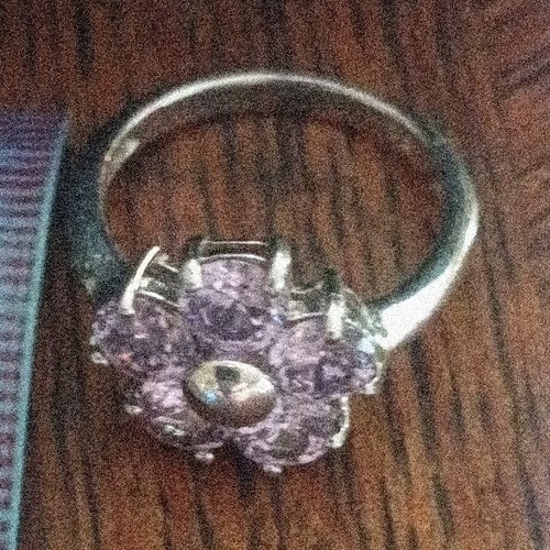 Bague sertie style cluster