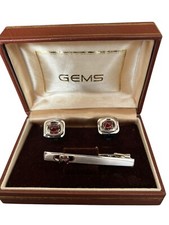 boutons de manchettes et pince