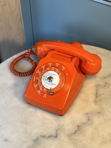 Vintage telephone orange - telephone,