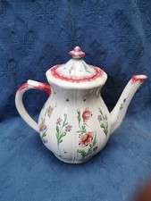 NANS-SOUS-SAINTE-ANNE. Grande cafetière en faïence à décor de fleurs.