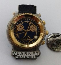 PIN’S  MONTRE / WATCH VUARNET  SIGNÉ . ARTHUS BERTRAND PARIS .. LIRE L ANNONCE