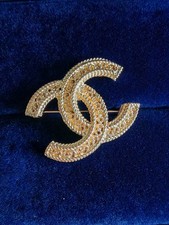 Broche vintage CHANEL CC logo