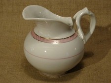 Ancien pot à lait en porcelaine liserets rose et or
