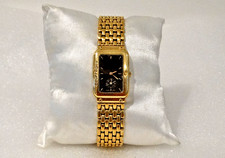 Rare, montre Courrèges royale 4101 en plaqué or de 1993 fabriquée en Suisse