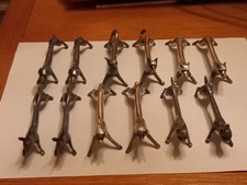 série de 12 portes couteaux anciens animaux en métal argenté