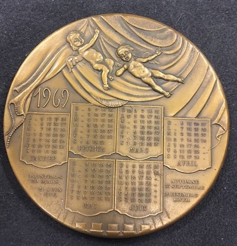 Medaille table calendrier - de,