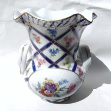 Vase en porcelaine décor de