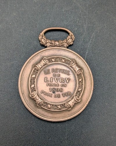 Médaille bronze réveil - en, le