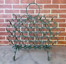 Porte revue en fer forgé