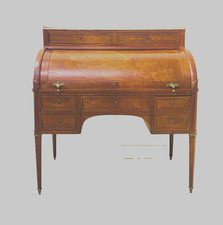 bureau cylindre debut du XIX en acajou à tirettes sur le cotés . XIX Siècle .