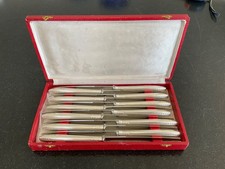Lot de  12 grands couteaux
