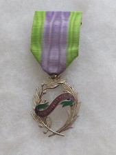 Une médaille Française  " Palmes De L'Encouragement Public "