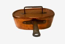 Ancienne casserole couverte en