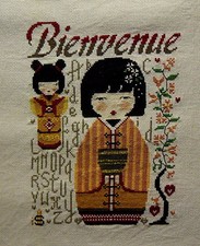 broderie point de croix  kokeshi bienvenue Isabelle Vautier
