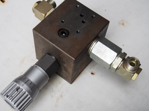 Limiteur pression - d),