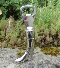 Ancien DECAPSULEUR métal argenté en forme de BOTTE D'EQUITATION longueur 13,7cm