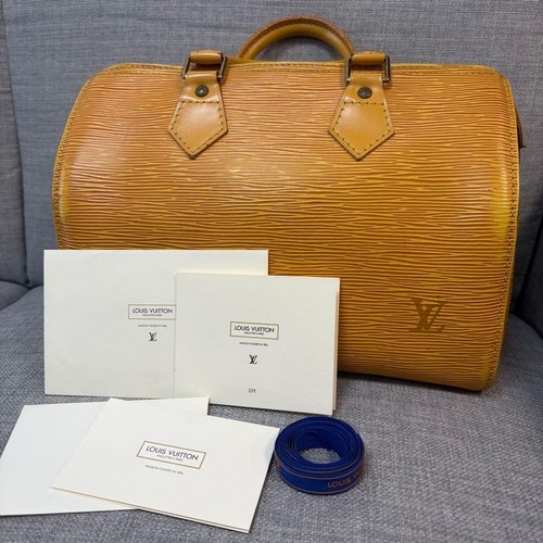 Sac main louis - à, vuitton