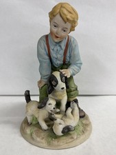 Groupe en porcelaine garçon