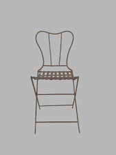 chaise en fonte de fer à enroulement assises métal tressée . XX siècle .