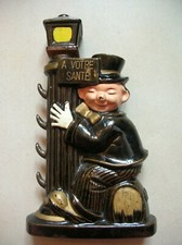 Bouteille à liqueur porte