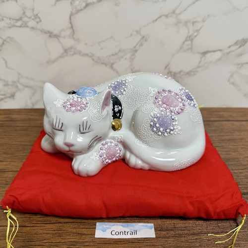 Chat coucheur porcelaine - en,