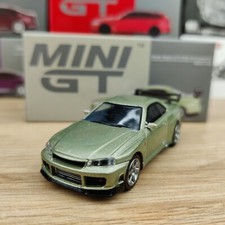 VOITURE MINI GT NISSAN SKYLINE GTR-34 TOMMYKAIRA R-Z 1999 N°697  1:64 NEUF BOITE