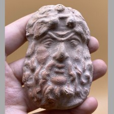 Statue tête ancienne en terre