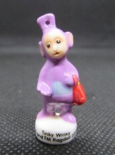 Fève Série Les Télétubbies " Tinky Winky en violet sac " Ragdoll 2004   #G60