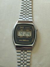 Vintage 80s Q&Q Montre LCD 30m Water Résistance 