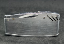 Ancien briquet à gaz vintage