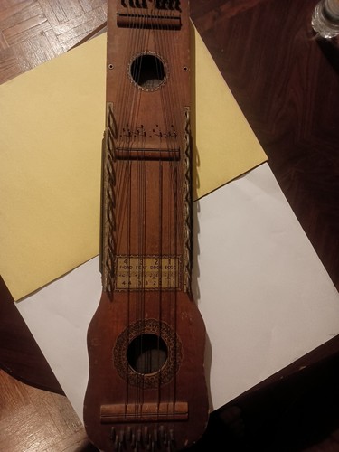 Antique ukelin manufacturer - antique, manufacturer's