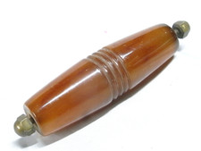 ?? ANCIENNE POIGNEE BAKELITE AMBRE POIDS 97 GRAMMES