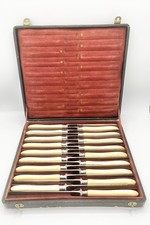 18 couteaux de table manche os