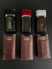 3 FLACONS DE CARTIER CHACUN DE 30ML VINTAGE AVEC SON ÉTUI CUIR