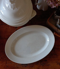Grand plat ovale ancien en porcelaine opaque de Lunéville XIXe s. terre de fer